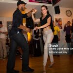 Amsterdam, The Netherlands - August 27, 2016: couple dancing salsa at the closing party at Rialto Cinema during World Cinema Amsterdam festival, a world film festival held from 18 to 27/08/2016